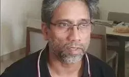 डीयू के प्रोसफर के घर पर महाराष्ट्र पुलिस का छापा,कई सामान बरामद