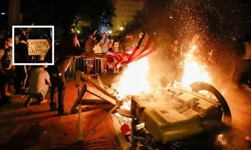 अमेरिका में गोरे और काले के लड़ाई हुई भयानक, जल गए कई शहर