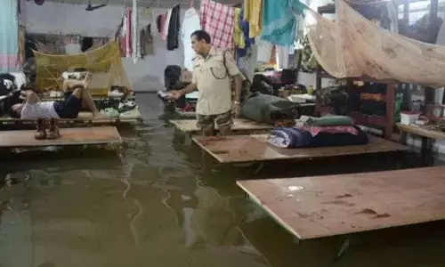 भारी बारिश से असम में बाढ़, 12 की मौत, नदियां उफान पर, CRPF हेडक्वार्टर में घुसा पानी