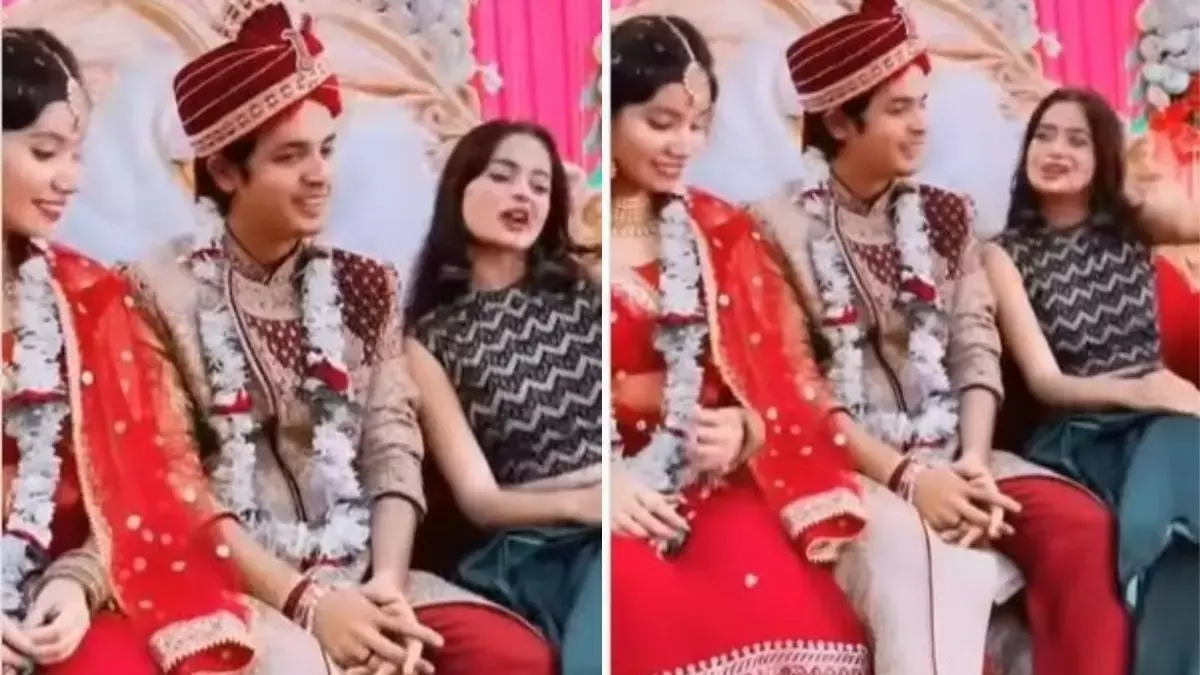 वरमाला के बाद स्टेज पर बैठे थे दूल्हा-दुल्हन, तभी जीजा के बगल में जा बैठी साली और… (Watch Viral Video) वरमाला के बाद स्टेज पर बैठे थे दूल्हा-दुल्हन, तभी जीजा के बगल में जा बैठी साली और… (Watch Viral Video)