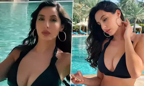 Nora Fatehi ने सेक्सी स्विमसूट पहनकर पूल में लगाईं डूबकी, बोल्डनेस से भरा ये Video देखकर उड़े फैंस के होश Nora Fatehi ने सेक्सी स्विमसूट पहनकर पूल में लगाईं डूबकी, बोल्डनेस से भरा ये Video देखकर उड़े फैंस के होश