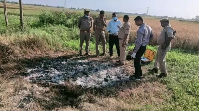 Dead body burnt field after killing married woman