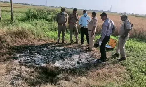 Dead body burnt field after killing married woman