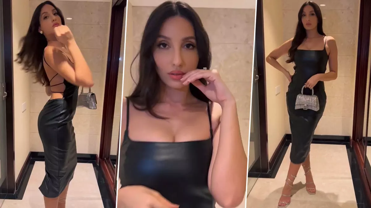 Nora Fatehi  Sexy Video Photo:  बैकलेस हॉट ब्लैक आउटफिल में नोरा का दिखा ग्लैमरस अवतार, यूजर्स का दिल हुआ धक-धक