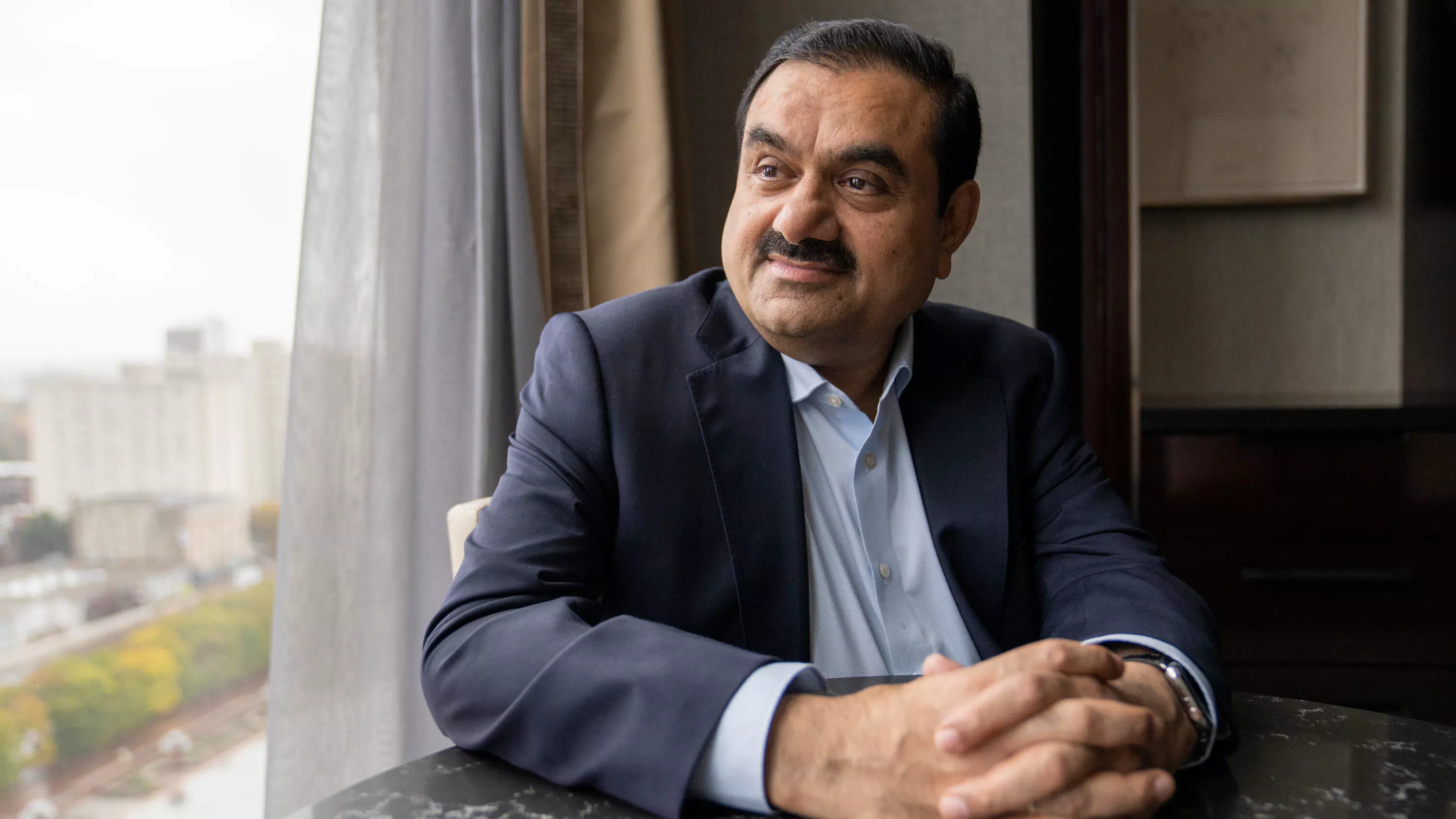 Adani Group पर 15 हजार करोड़ का निवेश करने वाली GQG Partners के शेयर टूटे, मार्केट में फिर मच सकती है तबाही