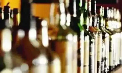 Liquor shop found in railway workers house during Excise Department raid Liquor shop found in railway workers house during Excise Department raid