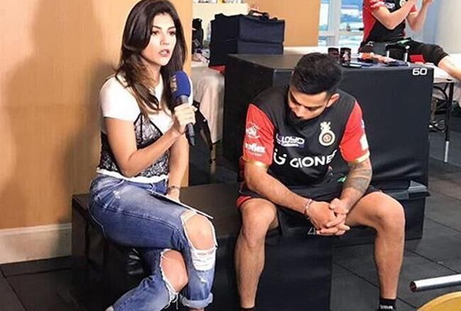 IPL : इंटरव्यू के दौरान एंकर की फटी जींस को घूरती विराट कोहली की तस्वीर वायरल