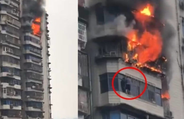 धूकर धूकर जलती इमारत से कूद गया, देखें वीडियो
